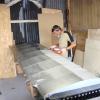Application de la couche d'enduit aluminium.